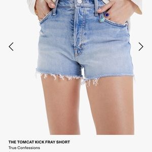 MOTHER denim The TomCat kick fray shorts.